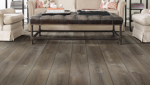 rustic wide-plank wood-look luxury vinyl floor in a contemporary living room